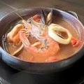 料理メニュー写真 魚介類のトマトスープ