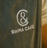 SHIMA CAFE　＆CURIOUSのロゴ
