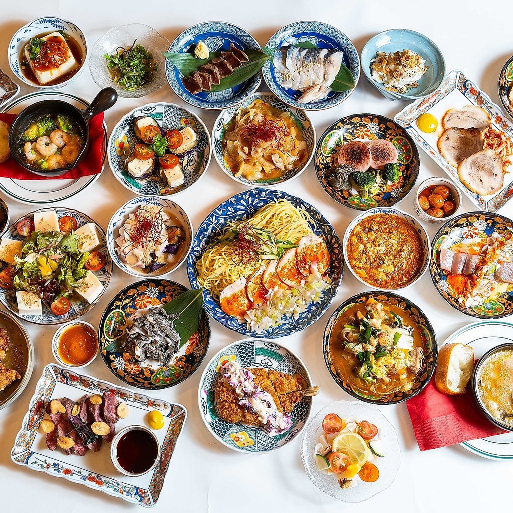 2001年　JR甲子園口駅に多国籍料理店をオープン　金融業界との会社勤めと並行