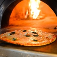 窯で焼いてるローマピッツァは絶品です