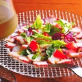料理メニュー写真 真蛸のソップレサータ　バジル風味のトマトソース