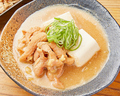 料理メニュー写真 豆腐入りモツ煮込み
