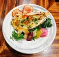 料理メニュー写真 牡蠣と旬の野菜を使ったグラチネ  エスカルゴバター風