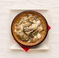 料理メニュー写真 牡蠣と長ネギのアヒージョ