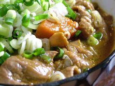 自家製もつ煮込みの写真