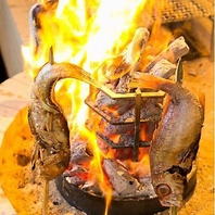 本格炉端焼き！名物料理「原始焼き」をご賞味ください。