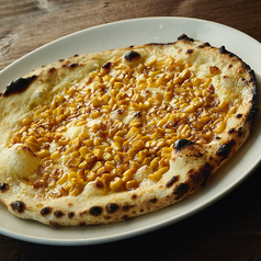 焼きもろこしと焦がし醤油マヨのピッツァ