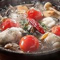 料理メニュー写真 牡蠣とウニのアヒージョ