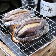 鮮度抜群の活あわび！五感で楽しむ蝦夷あわび踊り焼き