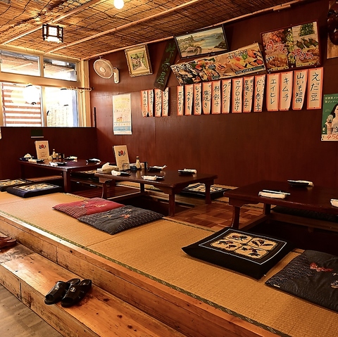 名物「ザル焼き」が楽しめる、地元で愛される沖縄居酒屋。