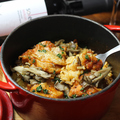 料理メニュー写真 Spicy Chicken and Mushrooms Tiella barese (Italian cooked Rice)