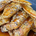 料理メニュー写真 ”鳥真の逸品” 信玄鶏の甘辛手羽先揚げ 一本