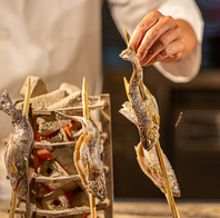 名物！原始焼き広島の食材をじっくりと炭火で