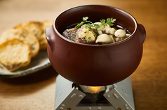 せせりときのこのアンチョビアヒージョ