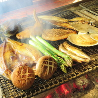 炉端でじっくり焼き上げる北海道産食材