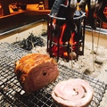 料理メニュー写真 塊り肉の炭火ポルケッタ