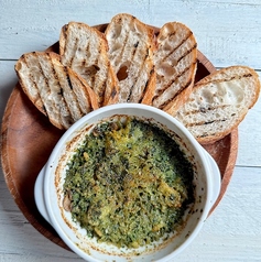 つぶ貝とマッシュルームの香草バター焼き