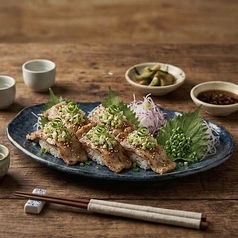 ネギ塩豚カルビ寿司 四貫