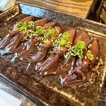 とろける濃厚さ！ホタルイカのレバ刺し風。ねっとりとした旨味が口に広がり、お酒が進む絶品珍味です