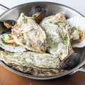 料理メニュー写真 殻ごと牡蠣の白ワイン蒸し