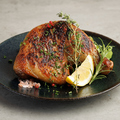 料理メニュー写真&nbsp;原始人の骨付きジャークチキン