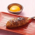 料理メニュー写真 川俣シャモ 自家製つくね串のタレ焼き～卵黄ソースで～