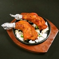 料理メニュー写真 タンドリーチキン（一本）