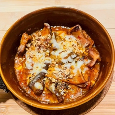 豚モツと唐辛子のトマト煮込み