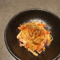 料理メニュー写真 タコとオリーブのトマトパスタ