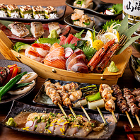 鮮魚舟盛りと炭火焼き鳥を味わう名物料理