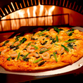 ピザ窯で焼き上げているので、パリッとした生地の食感をお楽しみ下さい。※写真はイメージ